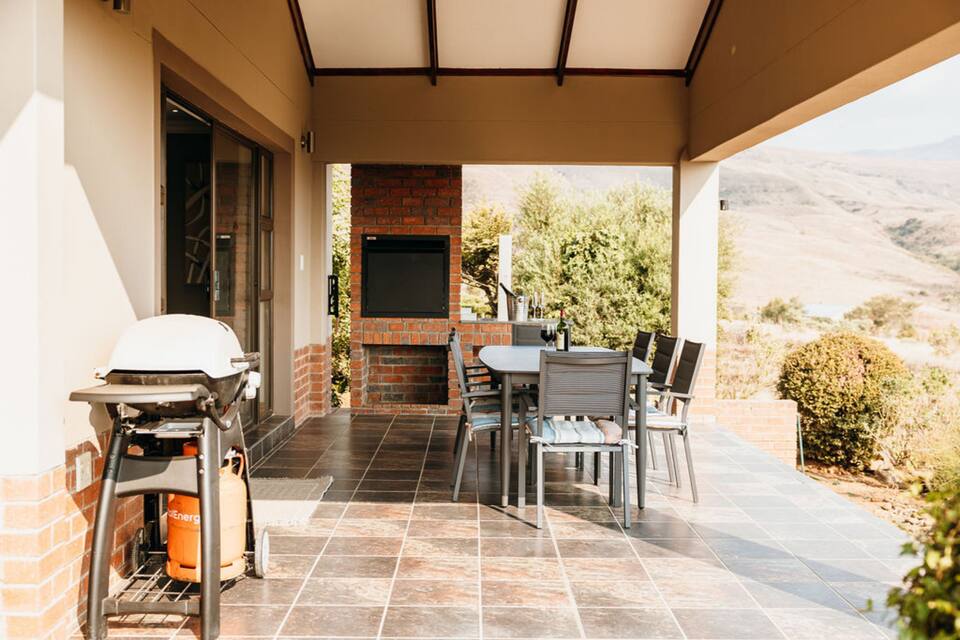 Outdoor patio and braai with mountain views, Zebra View Drakensberg